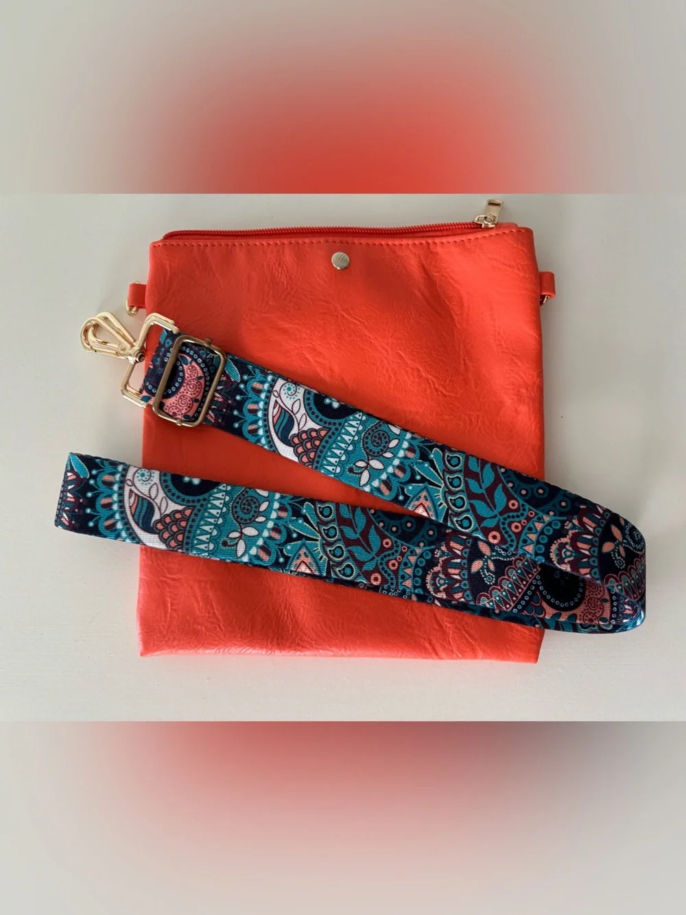 Stylish Coral Crossbody Clutch with Patterned Adjustable Strap